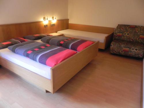Posteľ alebo postele v izbe v ubytovaní Hotel Schoberhof
