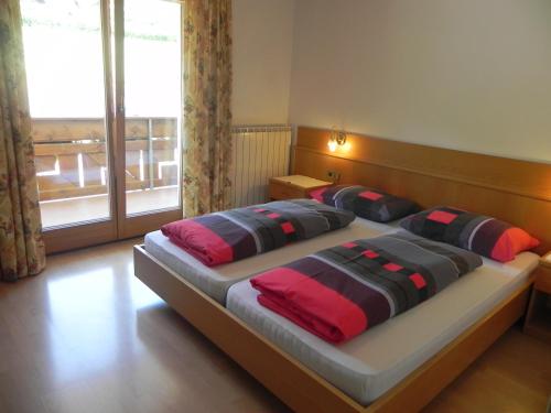 Кровать или кровати в номере Hotel Schoberhof