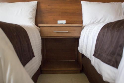 Madison Suitesにあるベッド