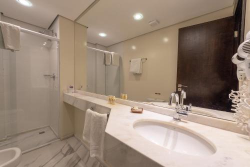 Ein Badezimmer in der Unterkunft Class Hotel Rio Claro