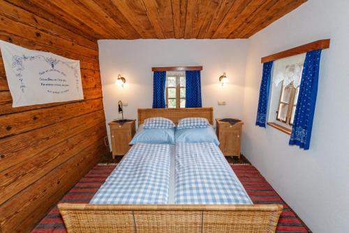 מיטה או מיטות בחדר ב-Ferienhaus Pilch Hiasl