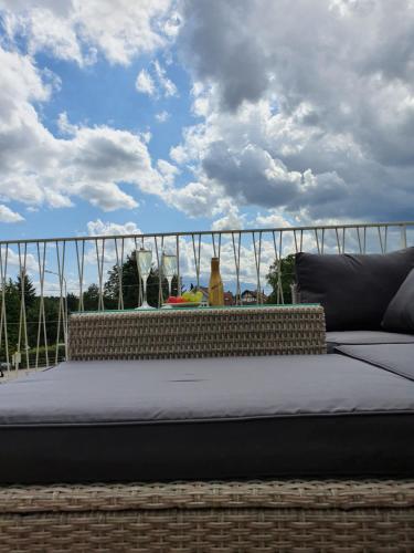 a bed sitting on top of a brick wall at Wohnstation in Subingen