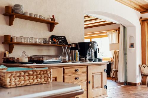 a kitchen with a counter and a counter top with a counter top at Lake Villa Lotus in Luzern
