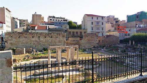 a view of the ruins of a city at AEOLIS SUITES in Athens