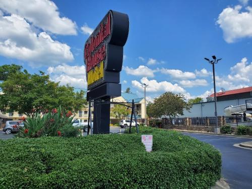 a sign for a fast food restaurant on a street at Colonial House Motel in Pigeon Forge