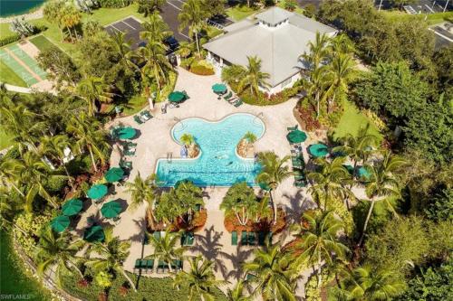 an aerial view of a pool at a resort at Vacation in Paradise in Lely Resort