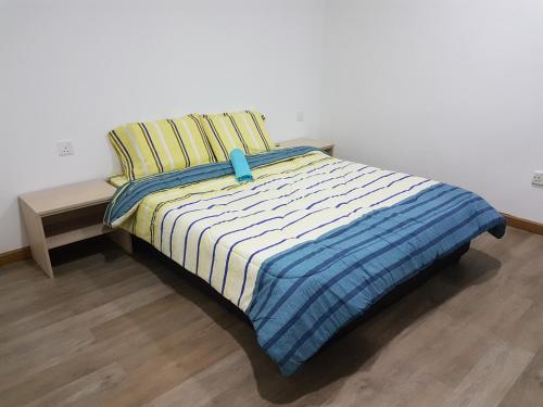 Krevet ili kreveti u jedinici u objektu Sembulan @ Ning Guesthouse 宁舒民宿
