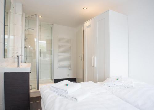 Postel nebo postele na pokoji v ubytování Appartement Brink Fichtenweg 41