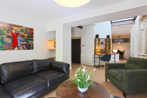 Гостиная зона в Le Relais DUCAL - Appartements d'Hôtes Vieille Ville