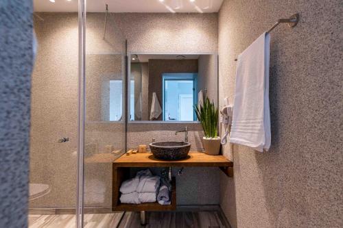 Kylpyhuone majoituspaikassa Valtes Luxurious Apartments