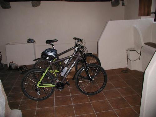 a bike is parked in a garage at Etxatoa in Odériz