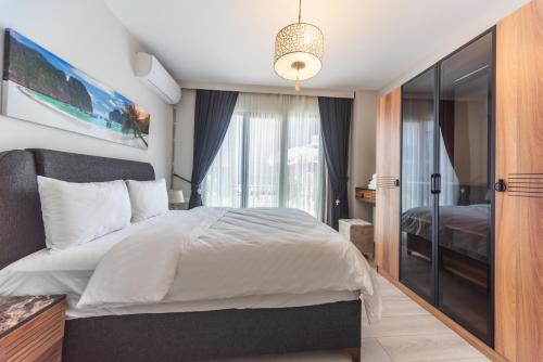 Katil atau katil-katil dalam bilik di Green Hills Suites