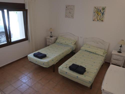 Ένα ή περισσότερα κρεβάτια σε δωμάτιο στο Casa Solvino