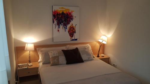 Postel nebo postele na pokoji v ubytování Villa Gardenia