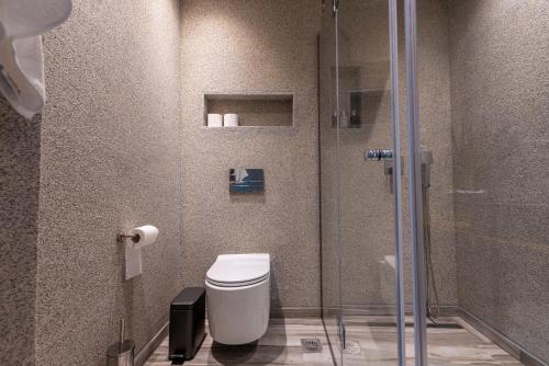 Koupelna v ubytování Valtes Luxurious Apartments