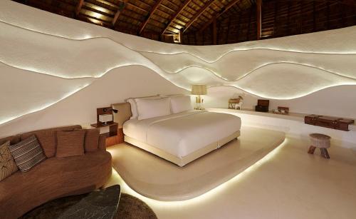 Llit o llits en una habitació de Boribot Pool Resort