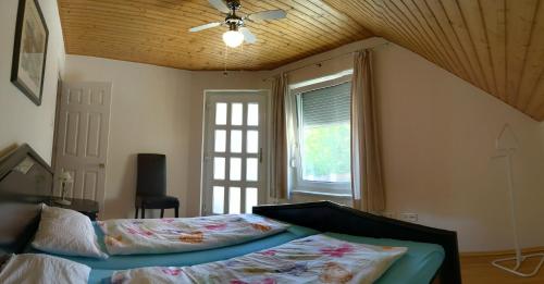 Säng eller sängar i ett rum på Appartments Hungaroland