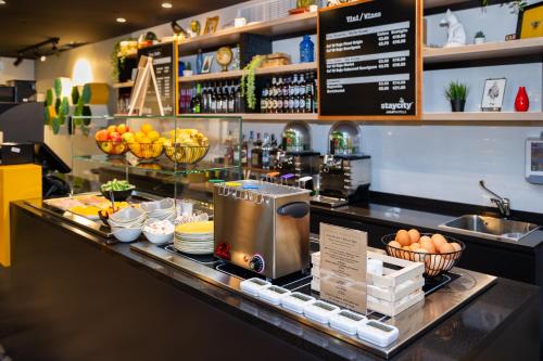 a kitchen with a counter with food on it at Staycity Aparthotels Venice Mestre in Mestre