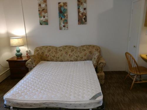 Ένα ή περισσότερα κρεβάτια σε δωμάτιο στο The Ohio Motel