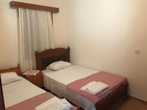 Ένα ή περισσότερα κρεβάτια σε δωμάτιο στο Pomos Small Sunny House