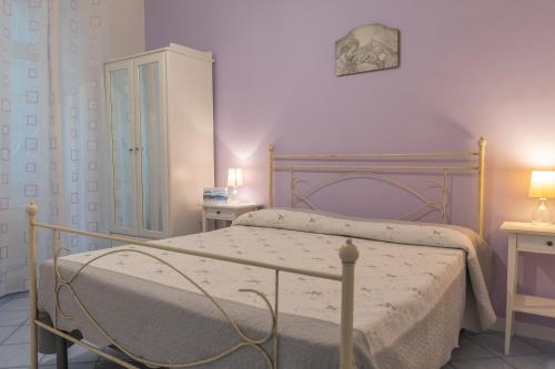 Postel nebo postele na pokoji v ubytování B&B Posidonia