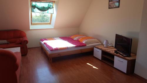 Ein Bett oder Betten in einem Zimmer der Unterkunft Haus Nora
