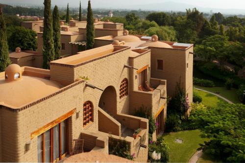 an aerial view of a house with trees at Mision del Sol Resort & Spa Adults Only in Cuernavaca