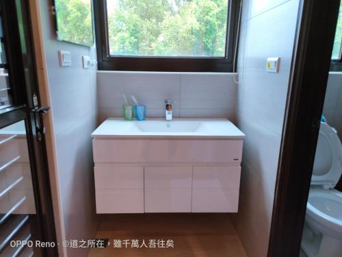 Ein Badezimmer in der Unterkunft 禾心居He Xin Ju Homestay