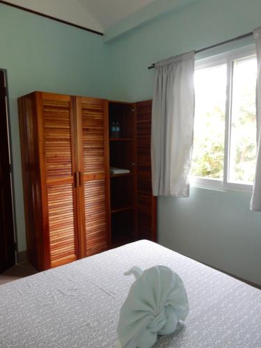 Postel nebo postele na pokoji v ubytování Oslob Seafari Resort