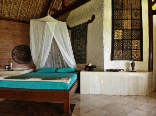 Katil atau katil-katil dalam bilik di Ciliks Beach Garden