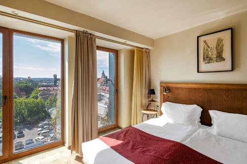 Postel nebo postele na pokoji v ubytování Best Western Vilnius