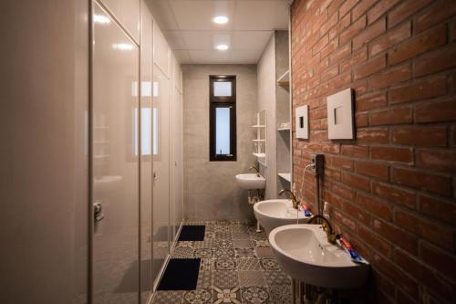 Kylpyhuone majoituspaikassa Dongshan Yi Hostel