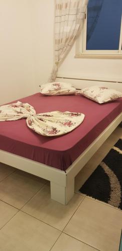 Llit o llits en una habitació de Luxus Apartments