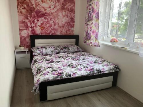 Postel nebo postele na pokoji v ubytování Apartmán na Lukách - Kopretina