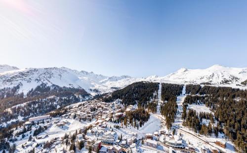 an aerial view of a ski resort in the snow at Waldhotel Arosa in Arosa
