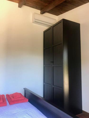 Postel nebo postele na pokoji v ubytování Alloggio Rurale