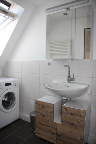 Ένα μπάνιο στο Ferienwohnung Nordlicht Laboe