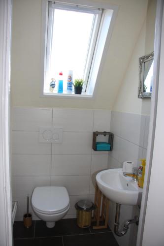 Ένα μπάνιο στο Ferienwohnung Nordlicht Laboe