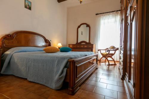 Postel nebo postele na pokoji v ubytování Casale Le Sette Vene