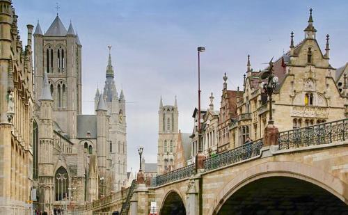 a bridge in a city with a bunch of buildings at Bennestay in Ghent