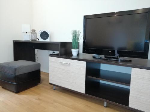 A television and/or entertainment centre at Fortress Apartments
