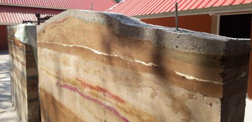 Gambar di galeri bagi Wapipathum Earthen House di Ban Na Lao