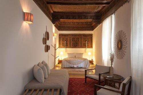 Postel nebo postele na pokoji v ubytování Riad la Cle de la Medina, location en exclusivite
