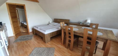 Postel nebo postele na pokoji v ubytování Penzion Dolní Dunajovice