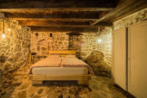 מיטה או מיטות בחדר ב-4 Limuna