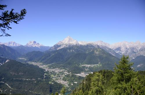 a view of a valley with mountains in the background at Villa Marmarole a Calalzo in Calalzo