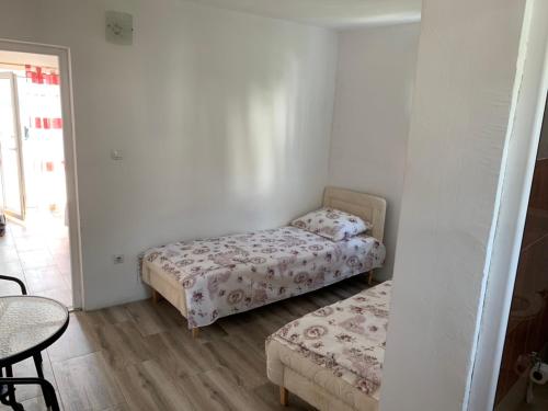 Katil atau katil-katil dalam bilik di Saša Apartments