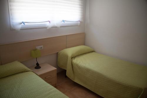 Postel nebo postele na pokoji v ubytování Apartamento Playa Moncofar - Xilxes