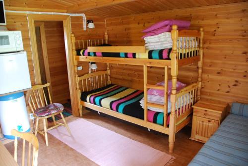 Postel nebo postele na pokoji v ubytování Lidens Stugby