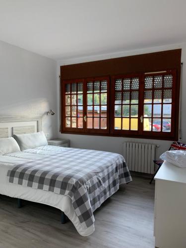 Postel nebo postele na pokoji v ubytování PASSAMANÉ 19 - Canillo - Casco Antiguo Hut 7867
